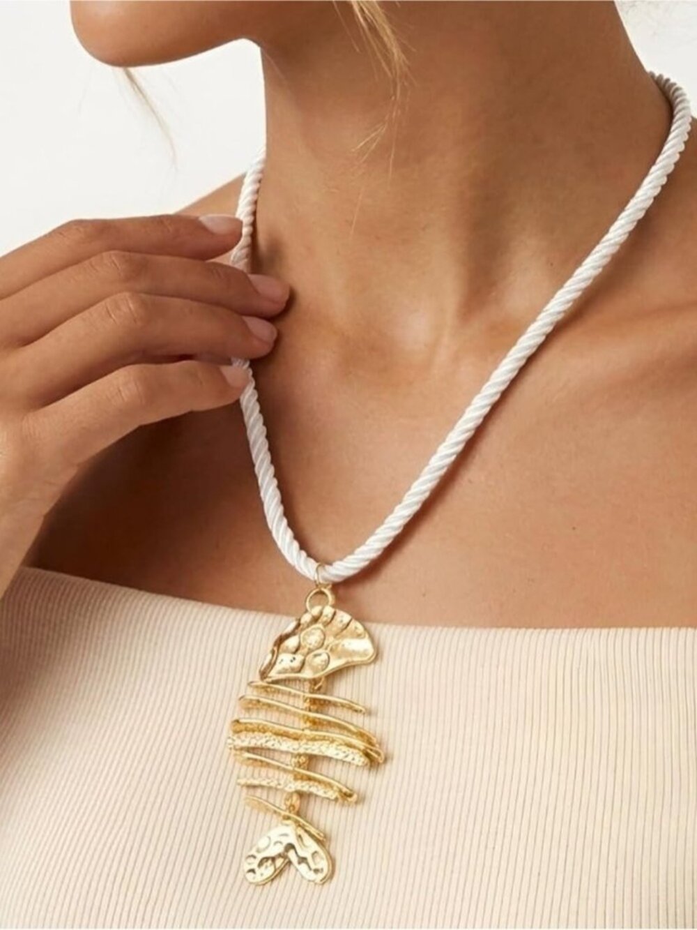 Gold Fishbone Pendant Necklace on White Rope